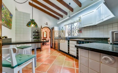 A beautiful villa in a peaceful, green setting.